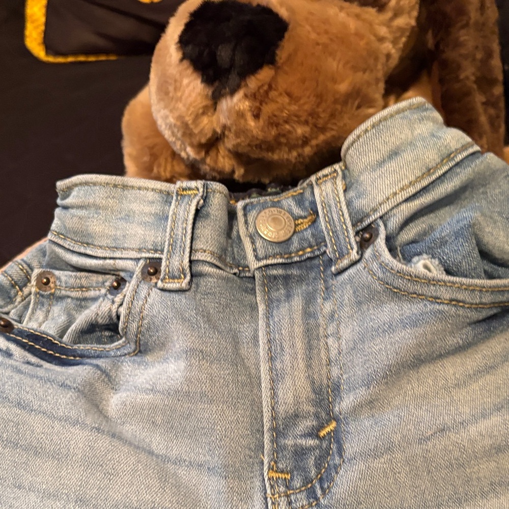 Levi's Dark Blue Denim boys or girls jeans. Has the waist adjustable inside.